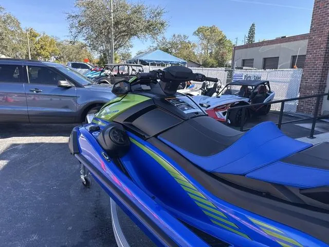 Slide: The Image of 2024 Yamaha Marine Waverunner VX Limited HO in azure blue, sleek design and ergonomic seating. - 7