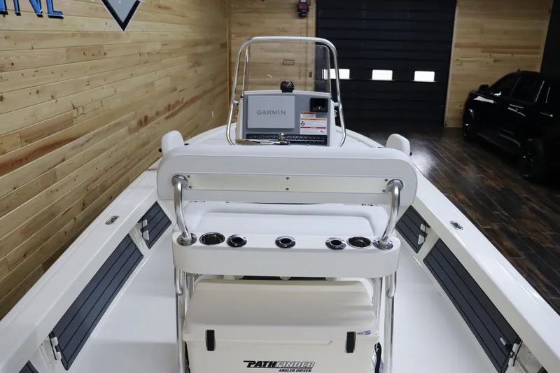 Slide: The Image of 2024 Pathfinder 2200 TRS boat interior with Garmin navigation system. - 12
