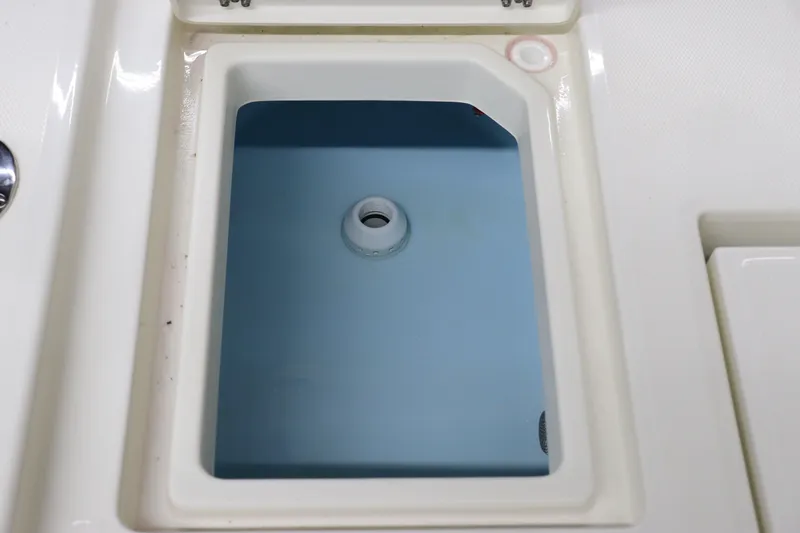 Slide: The Image of 2024 Pathfinder 2200 TRS boat livewell compartment. - 22