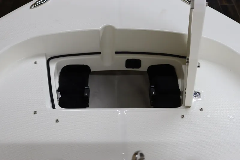 Slide: The Image of 2024 Pathfinder 2200 TRS boat storage compartment with open hatch. - 27