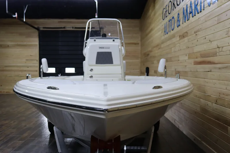 Slide: The Image of 2024 Pathfinder 2200 TRS boat in showroom. - 7