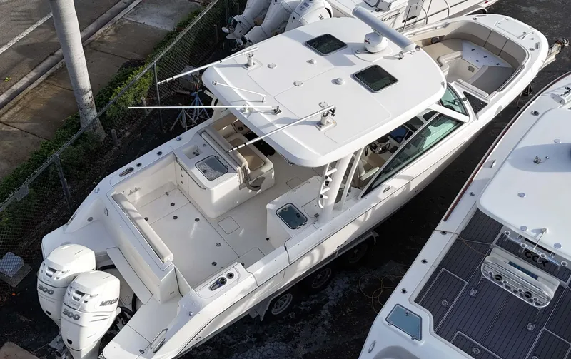 Slide: The Image of 2016 Boston Whaler 320 Vantage boat docked, aerial view. - 5