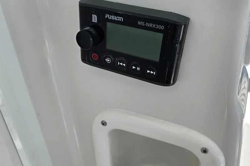 Slide: The Image of Fusion MS-NRX300 control panel on 2024 Sailfish 220 WAC boat. - 11