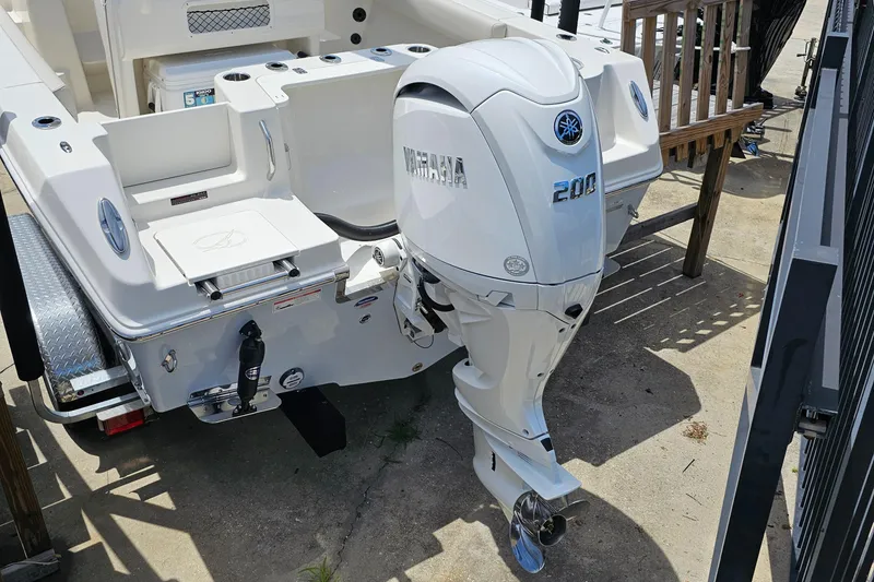 Slide: The Image of 2024 Sailfish 220 WAC boat with Yamaha 200 outboard motor. - 2