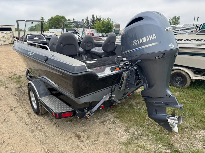 Slide: The Image of 2014 Stratos 385 XF boat with Yamaha 200 outboard motor on a trailer. - 5