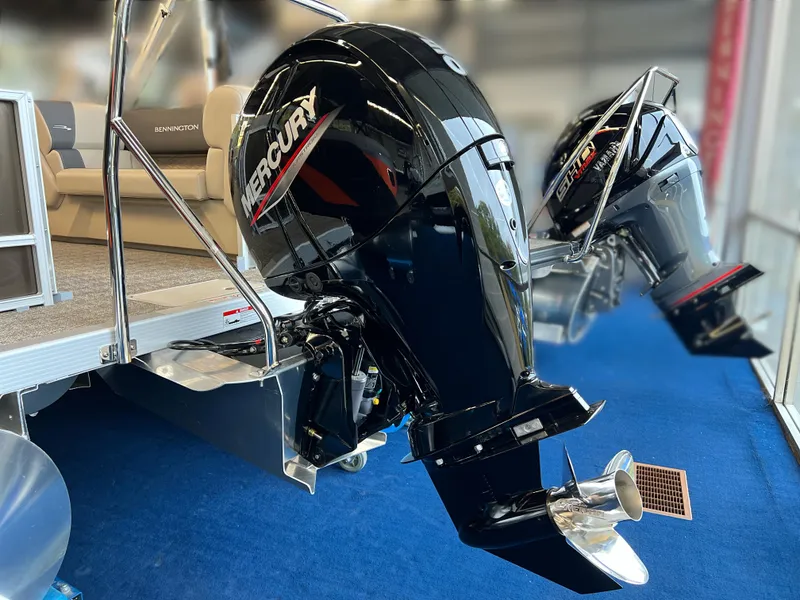 Slide: The Image of 2024 Bennington 22SSR boat with dual Mercury outboard engines on display. - 12