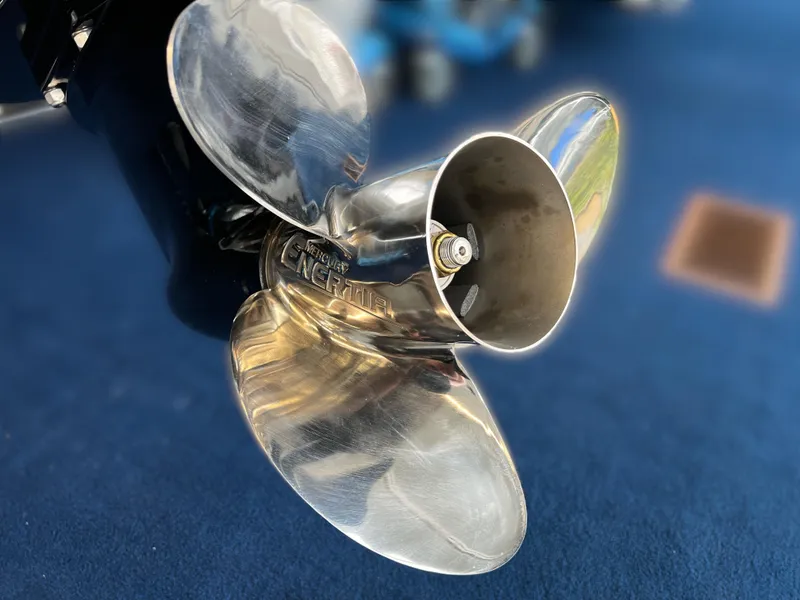 Slide: The Image of Close-up of a shiny propeller on a 2024 Bennington 22SSR boat. - 14