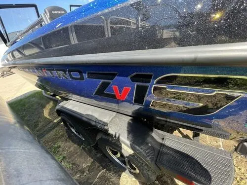 Slide: The Image of 2024 Nitro ZV19 Sport boat side view with logo. - 8