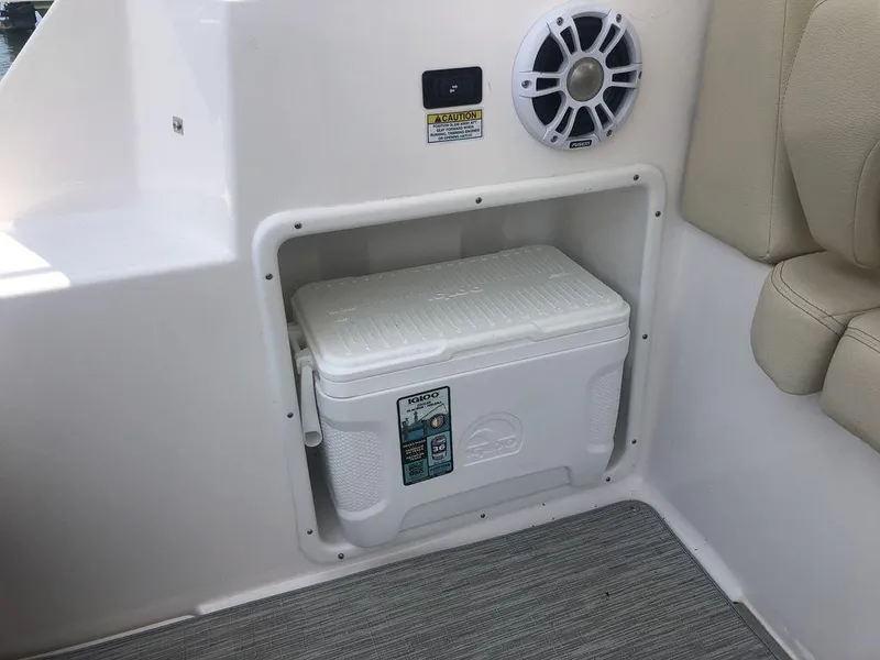 Slide: The Image of Built-in cooler compartment on a 2020 Regal 35 Sport Coupe boat. - 10