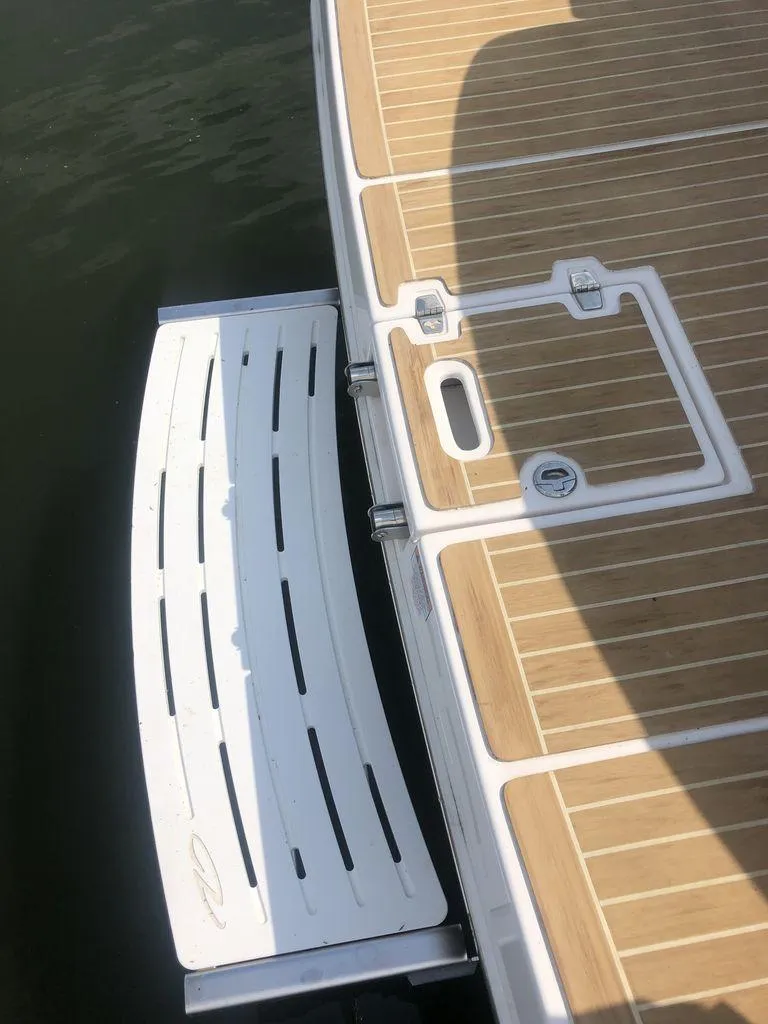 Slide: The Image of 2020 Regal 35 Sport Coupe swim platform and deck. - 13