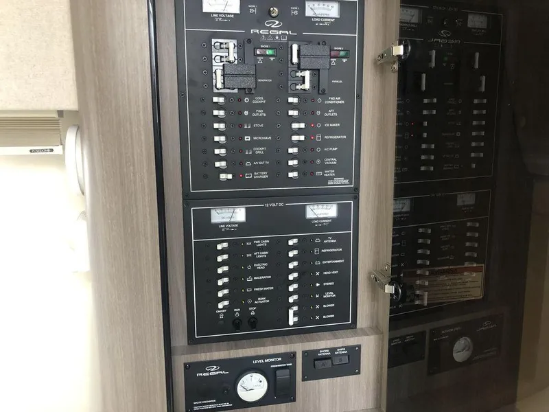 Slide: The Image of Control panel of a 2020 Regal 35 Sport Coupe boat. - 21
