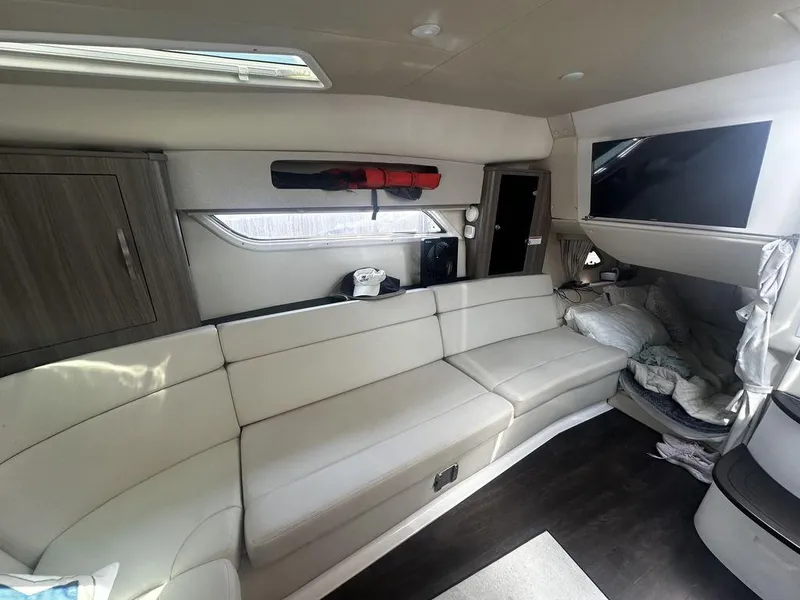 Slide: The Image of Interior of 2020 Regal 35 Sport Coupe with white leather seating and modern amenities. - 22