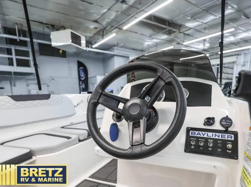 Slide: The Image of Steering console of 2024 Element M15 boat at Bretz RV & Marine showroom. - 13