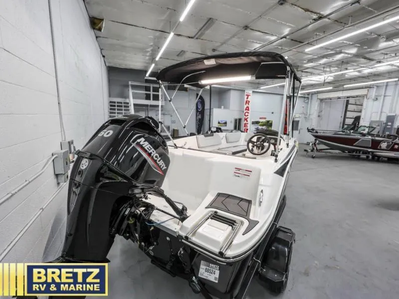 Slide: The Image of 2024 Element M15 boat with Mercury engine in showroom at Bretz RV & Marine. - 7
