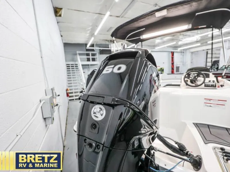 Slide: The Image of 2024 Element M15 boat with 50 HP engine at Bretz RV & Marine showroom. - 8