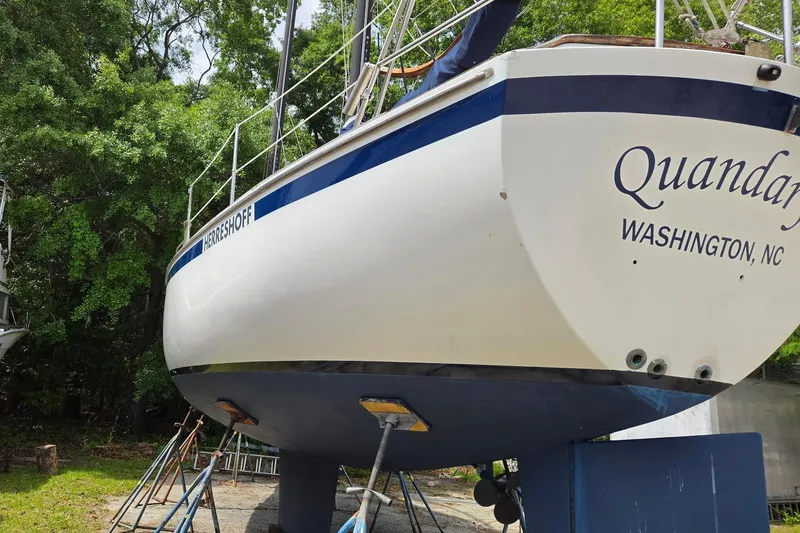 Slide: The Image of 1985 Herreshoff 38 Cat Ketch sailboat on land, named Quandary, Washington, NC. - 1