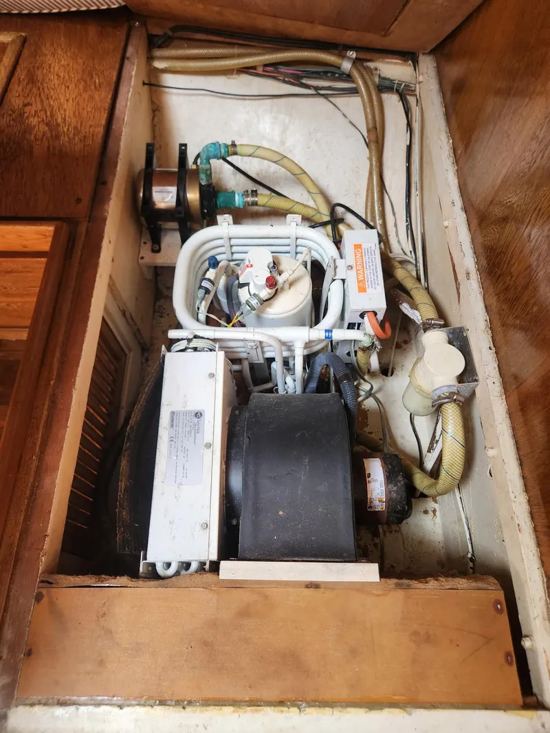 Slide: The Image of Engine compartment of a 1985 Herreshoff 38 Cat Ketch sailboat. - 36