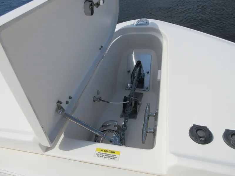 Slide: The Image of Anchor storage compartment on a 2016 Grady-White Freedom 307 boat. - 10