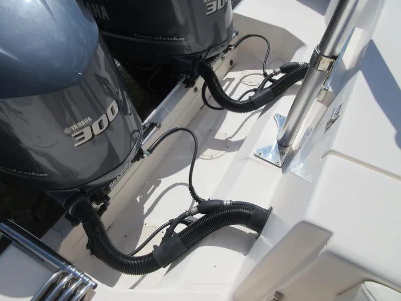 Slide: The Image of Twin Yamaha 300 engines on a 2016 Grady-White Freedom 307 boat. - 26