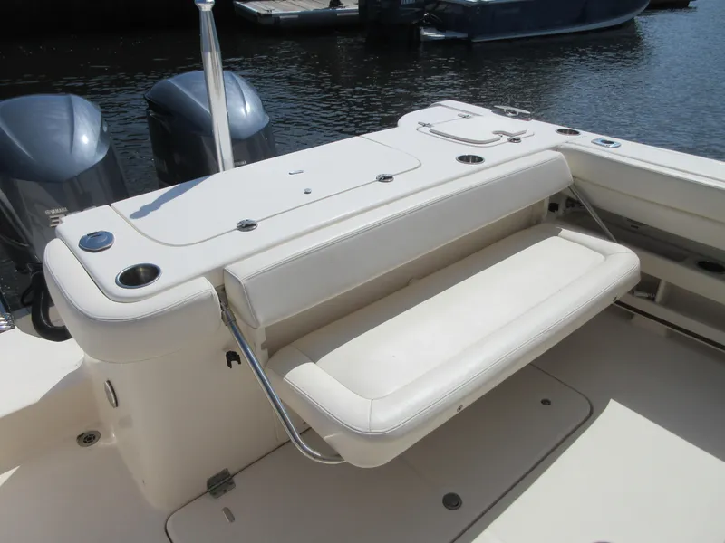 Slide: The Image of 2016 Grady-White Freedom 307 boat with foldable seating and dual engines. - 27