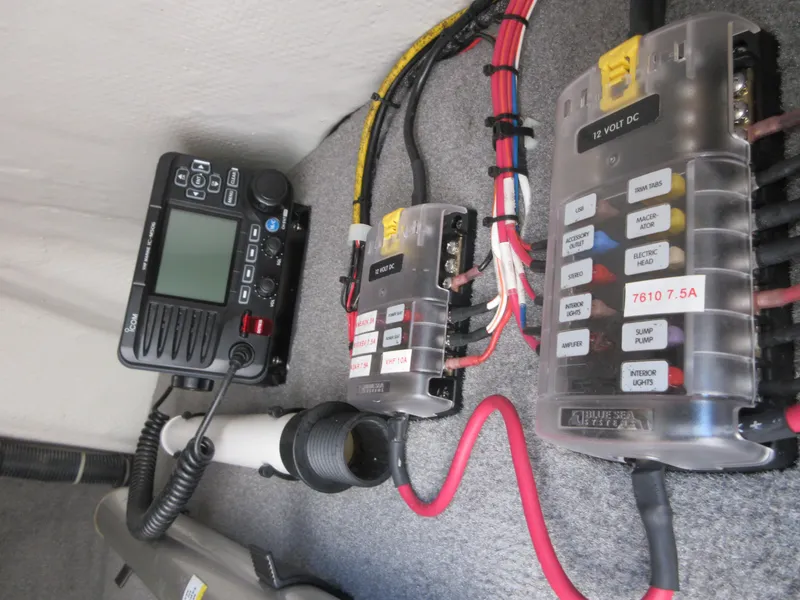 Slide: The Image of 2016 Grady-White Freedom 307 boat electrical system and control panel. - 32