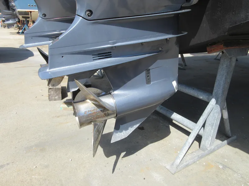 Slide: The Image of Close-up of 2016 Grady-White Freedom 307 boat propeller and lower unit. - 34