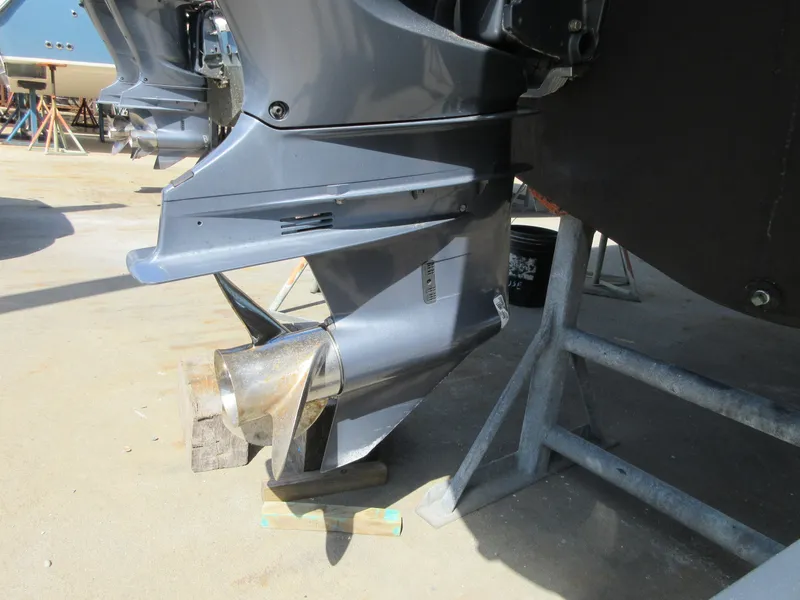 Slide: The Image of Close-up of 2016 Grady-White Freedom 307 boat propeller and lower unit. - 35