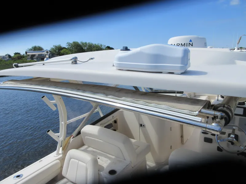 Slide: The Image of 2016 Grady-White Freedom 307 boat with Garmin equipment on a sunny day. - 7