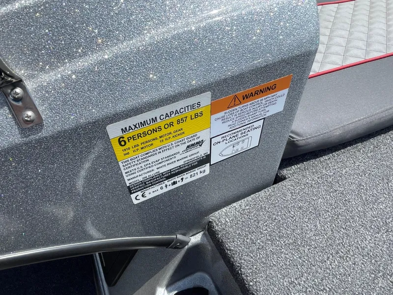 Slide: The Image of 2022 Triton 206 Allure boat capacity label, maximum 6 persons or 857 lbs. - 13