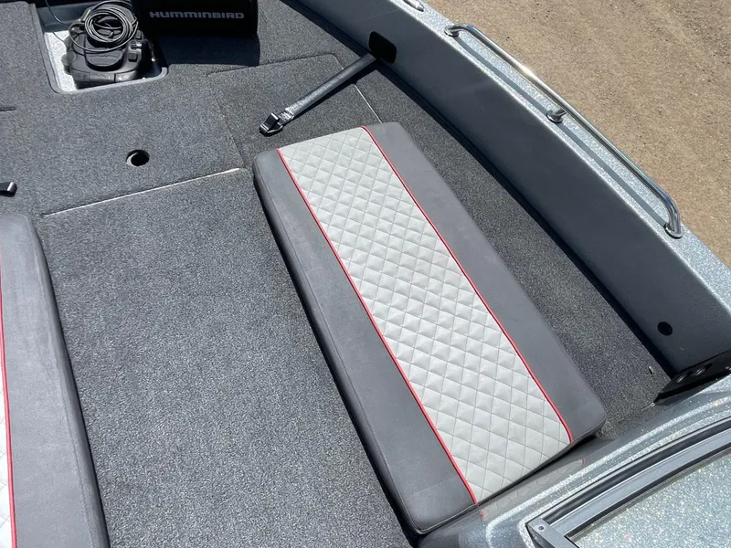 Slide: The Image of 2022 Triton 206 Allure boat interior with gray and red diamond-stitched seating. - 15