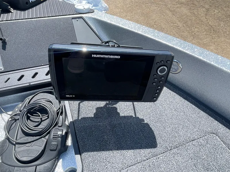 Slide: The Image of Humminbird fish finder on 2022 Triton 206 Allure boat. - 17