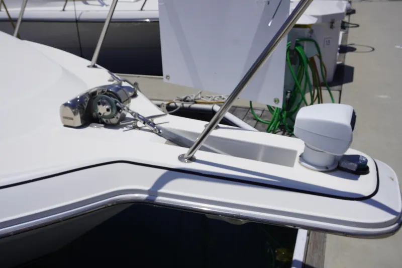 Slide: The Image of Bow of 1996 Wellcraft 3200 Martinique boat with anchor windlass. - 20