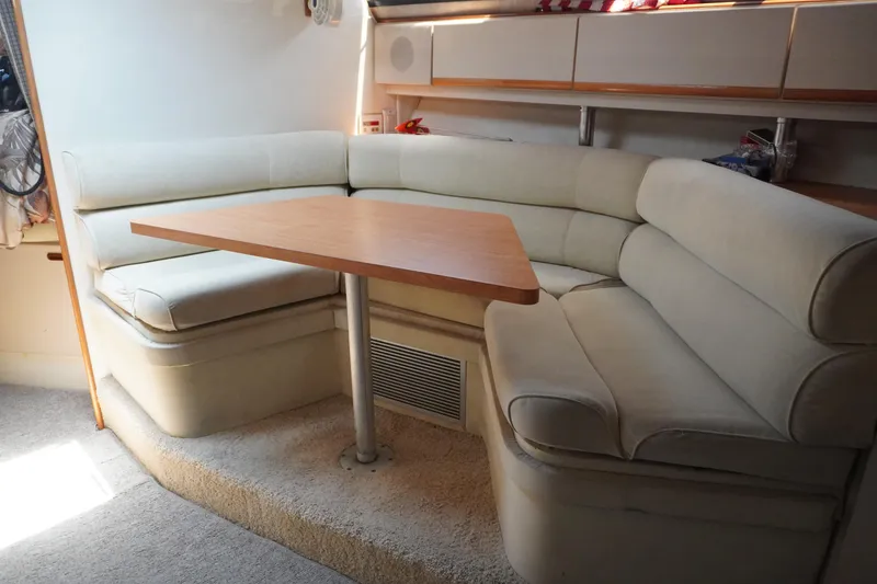 Slide: The Image of Interior of a 1996 Wellcraft 3200 Martinique yacht with seating area. - 22