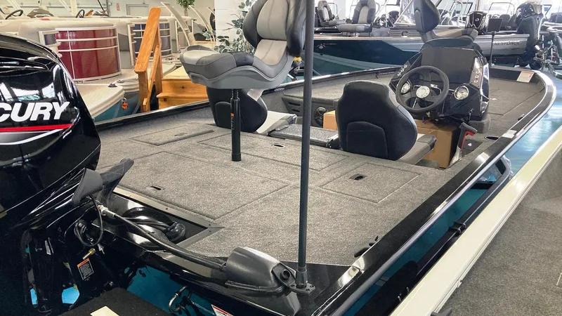 Slide: The Image of 2023 Crestliner XFC 189 fishing boat interior with Mercury outboard motor. - 3