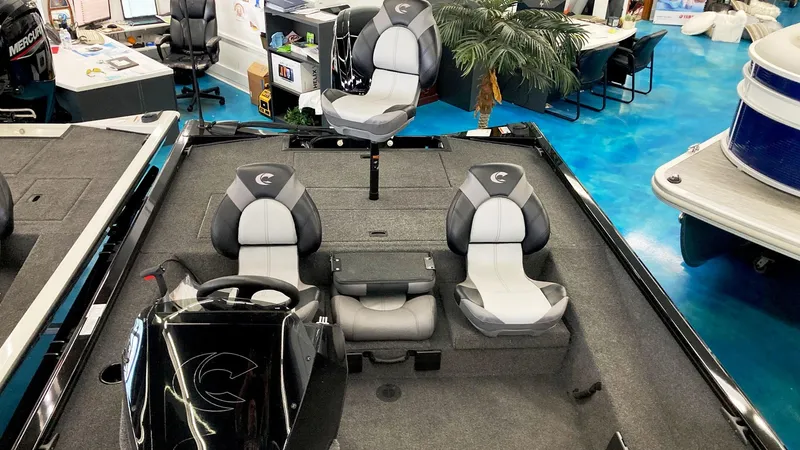 Slide: The Image of 2023 Crestliner XFC 189 boat interior with seating and steering console. - 4