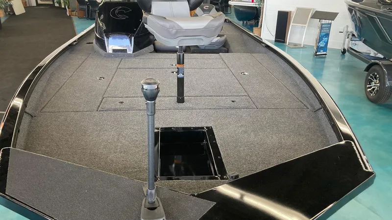 Slide: The Image of 2024 Crestliner XFC 189 fishing boat interior with spacious deck and seating. - 7