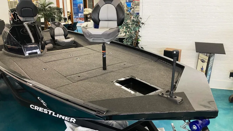 Slide: The Image of 2023 Crestliner XFC 189 fishing boat on display in showroom. - 8