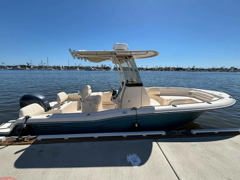 Slide: The Image of 2018 Grady-White Fisherman 216 boat docked by the water on a sunny day. - 2