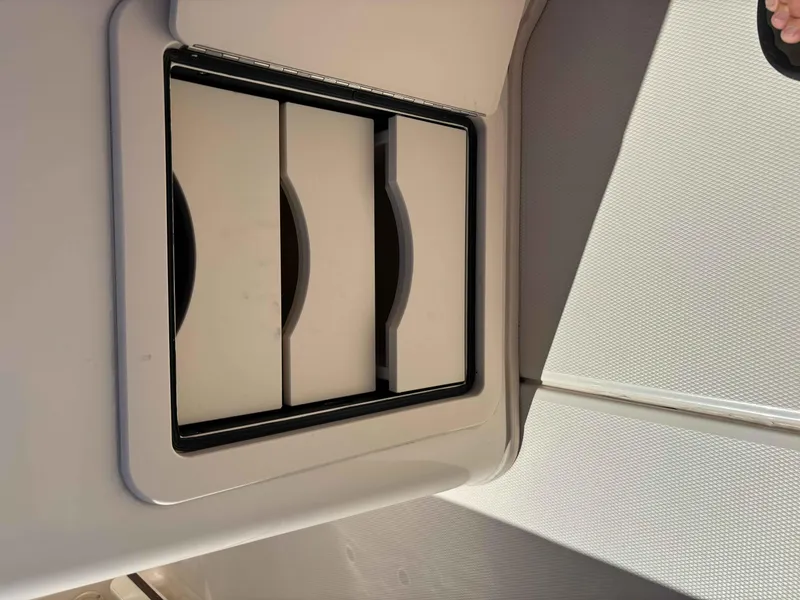 Slide: The Image of 2018 Grady-White Fisherman 216 boat storage compartment detail. - 5