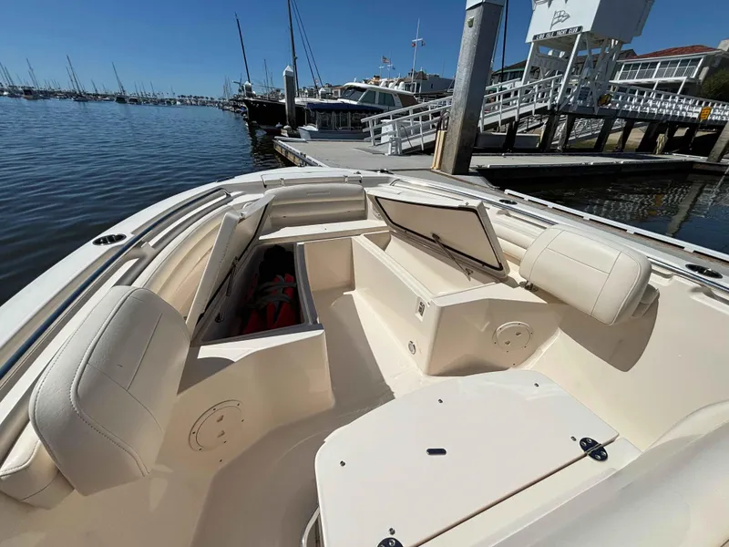 Slide: The Image of 2018 Grady-White Fisherman 216 boat interior at marina dock. - 8