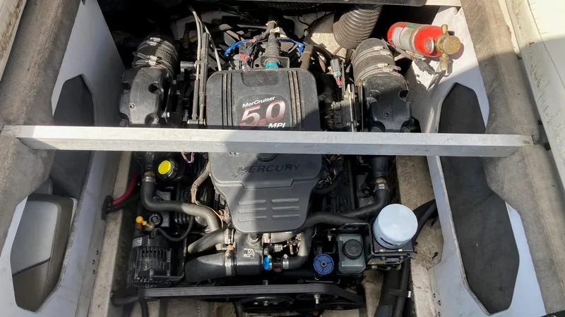 Slide: The Image of 2007 Sea Ray 210 Select boat engine compartment with MerCruiser 5.0 MPI engine. - 10