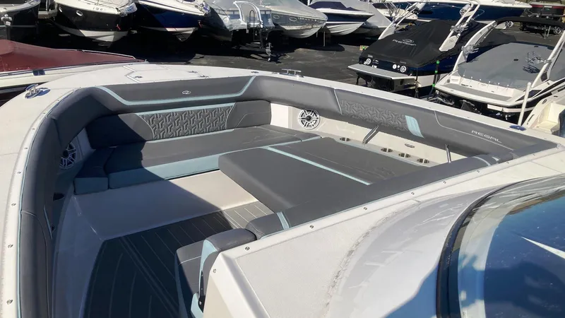 Slide: The Image of 2025 Regal 38 SAV boat interior with sleek seating and modern design. - 21