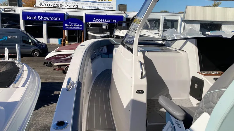 Slide: The Image of 2025 Regal 38 SAV boat interior at a showroom, showcasing sleek design and modern features. - 22