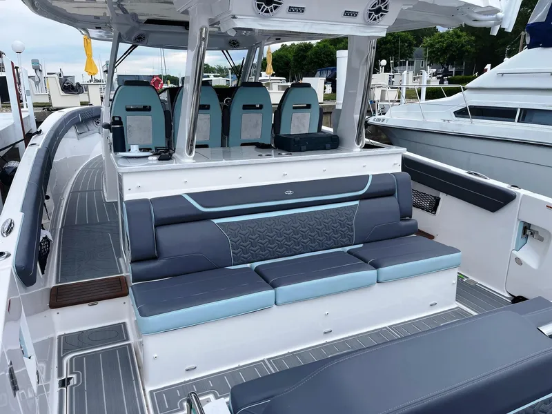 Slide: The Image of 2025 Regal 38 SAV boat interior with seating and helm station. - 8