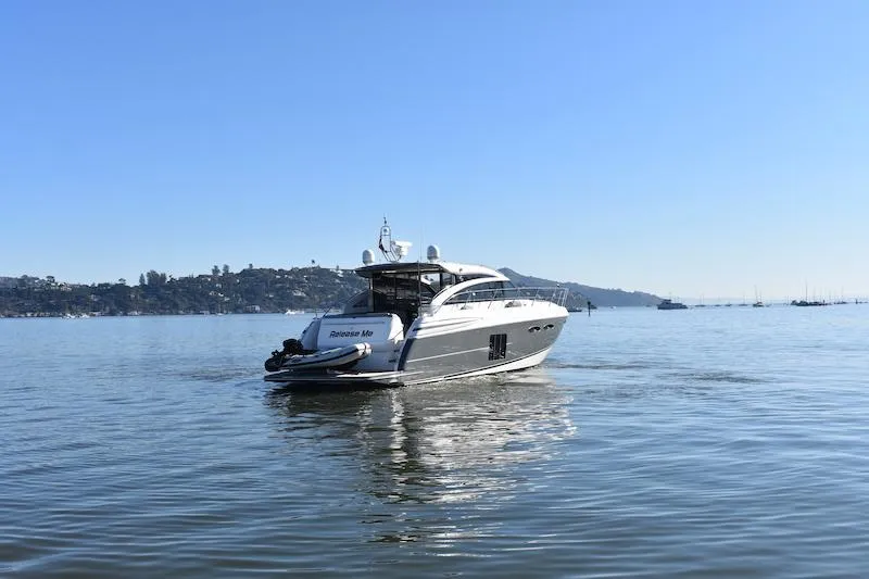 Slide: The Image of 2013 Princess V52 yacht cruising on a calm, sunny day. - 12