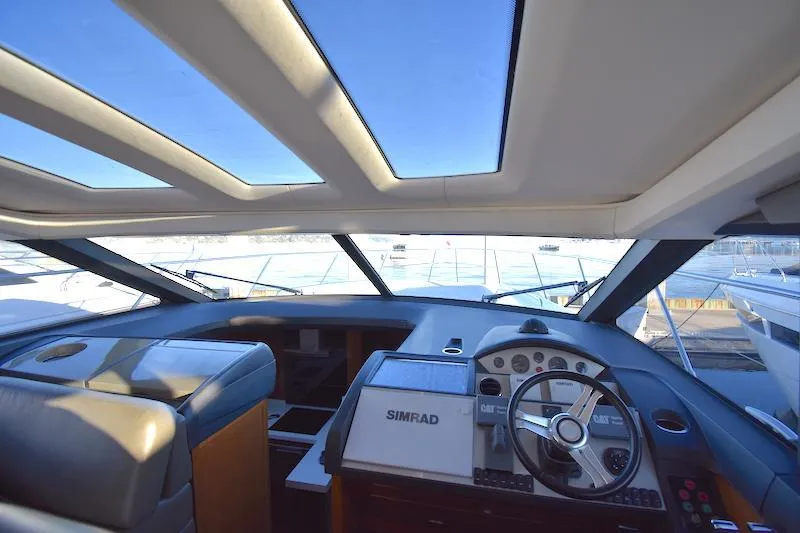 Slide: The Image of Interior helm of 2013 Princess V52 yacht with Simrad navigation system. - 22