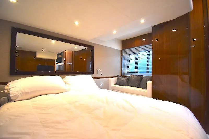 Slide: The Image of Luxurious bedroom interior of 2013 Princess V52 yacht with modern decor and cozy bedding. - 41