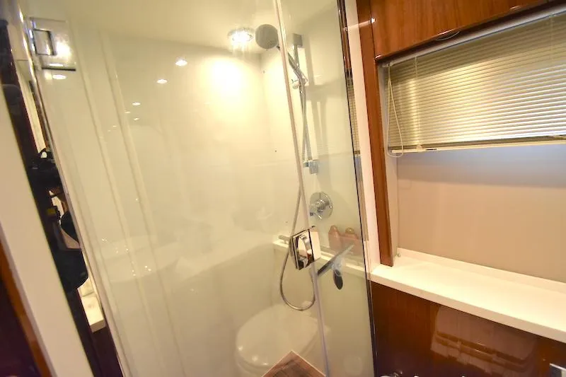 Slide: The Image of Bathroom interior of 2013 Princess V52 yacht with glass shower enclosure. - 46