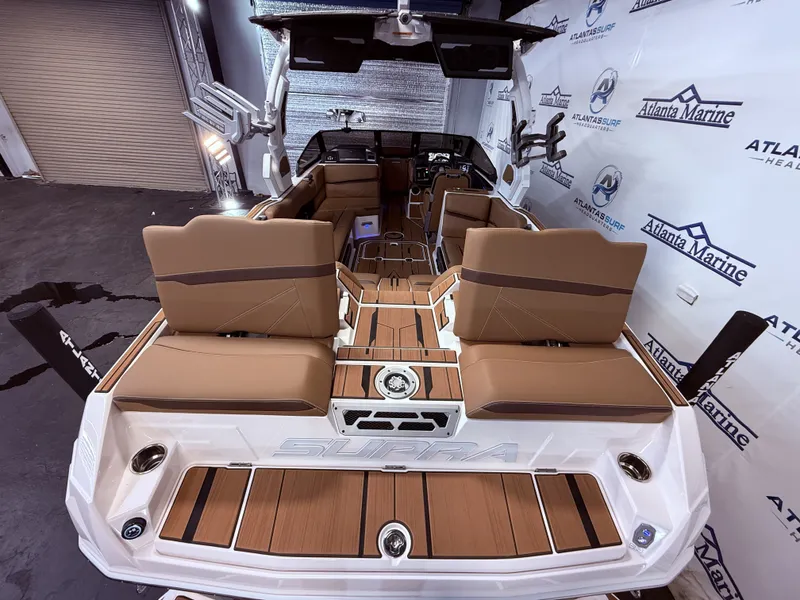 Slide: The Image of Interior of 2024 Supra SL 400 boat with luxurious seating. - 19