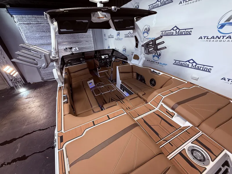 Slide: The Image of Interior of 2024 Supra SL 400 boat with luxurious features. - 20